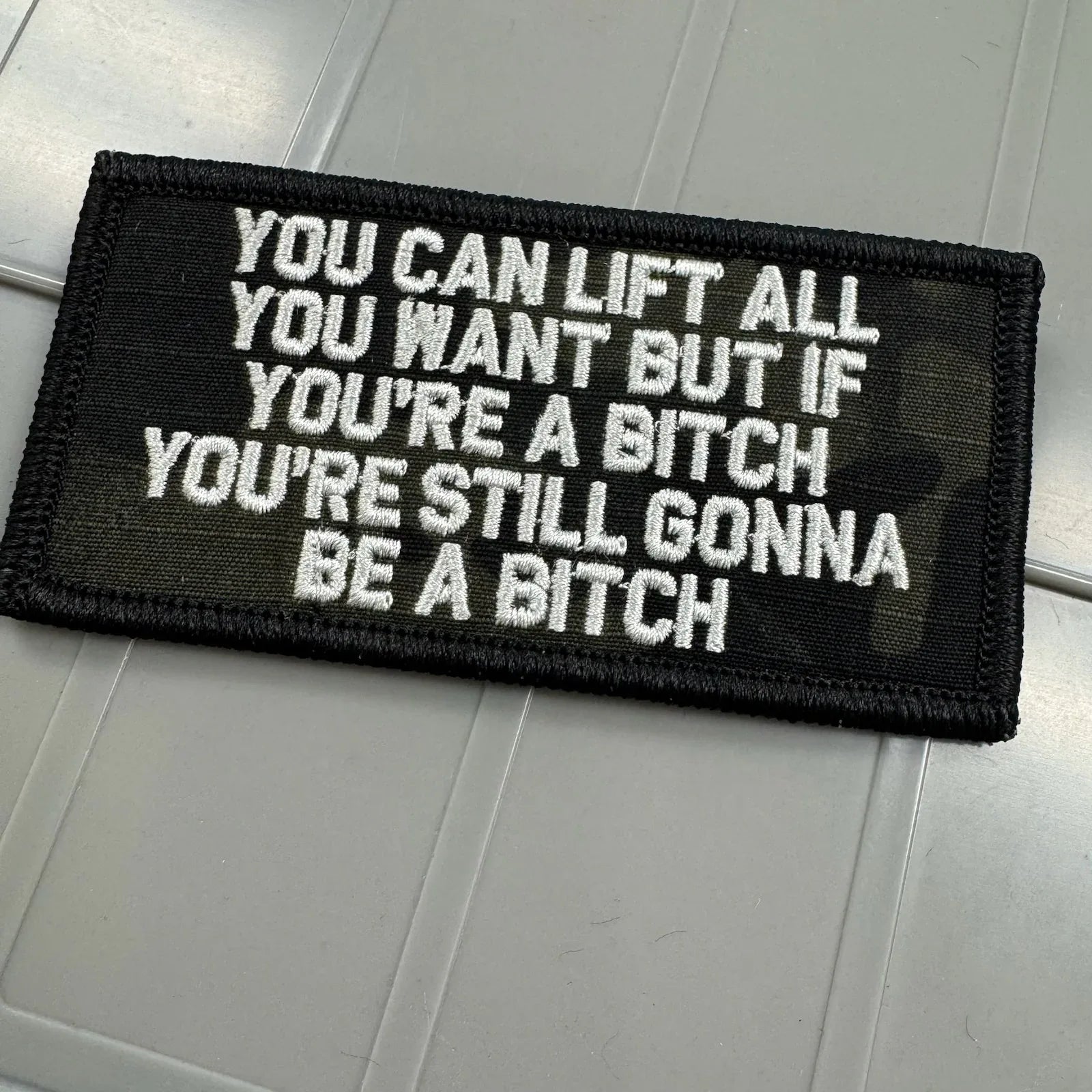 As Seen on Socials - You Can Lift All You Want But If You're A Bitch You're Still Gonna Be A Bitch  - 2x4 - Multicam Black w/Silver